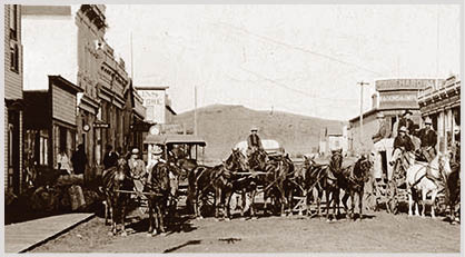 A black and white photo of a town street with a group of people and horses. AI generated content